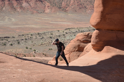 At Delicate Arch with strong wind